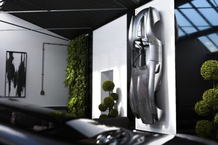 Ferrari Testa Rossa J Sculpture mounted on wall in garage